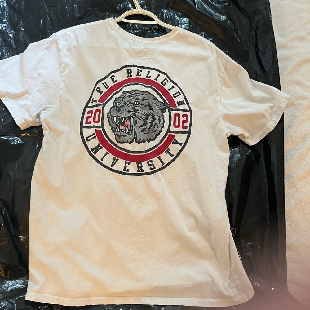 Authentic Men’s True Religion shirt.